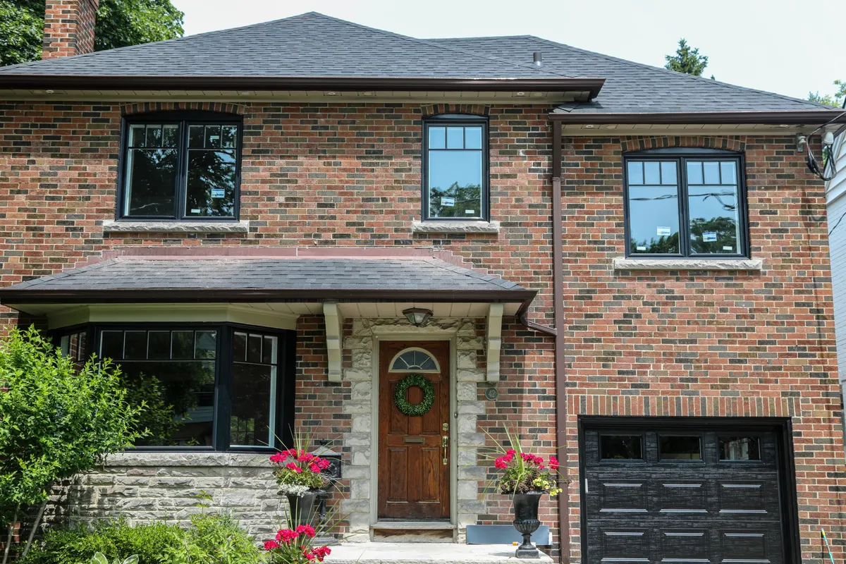 Brick home with updated windows and garage door